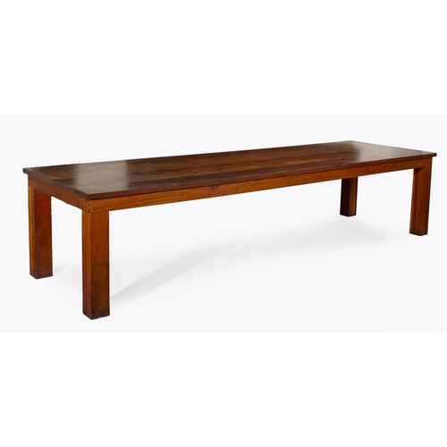 648 - AN IROKO DINING TABLE, MODERN