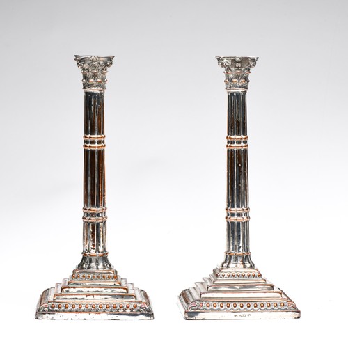 858 - A PAIR OF ELECTROPLATE CANDLESTICKS