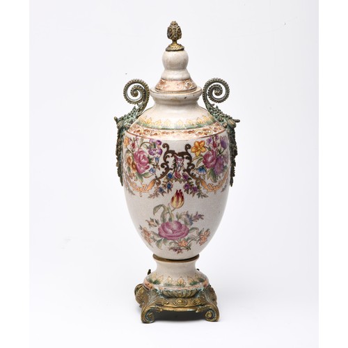 539 - A FRENCH STYLE PORELAIN AND GILT-METAL URN AND COVER