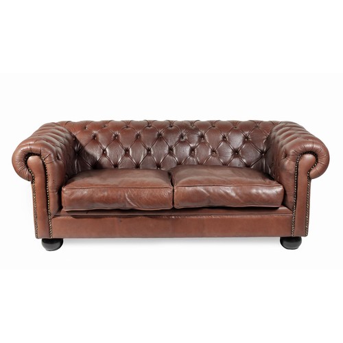 613 - A LEATHER CHESTERFIELD SOFA