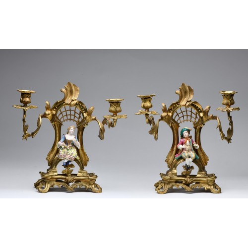 953 - A PAIR OF FRENCH ORMOLU AND PORCELAIN CANDELABRA