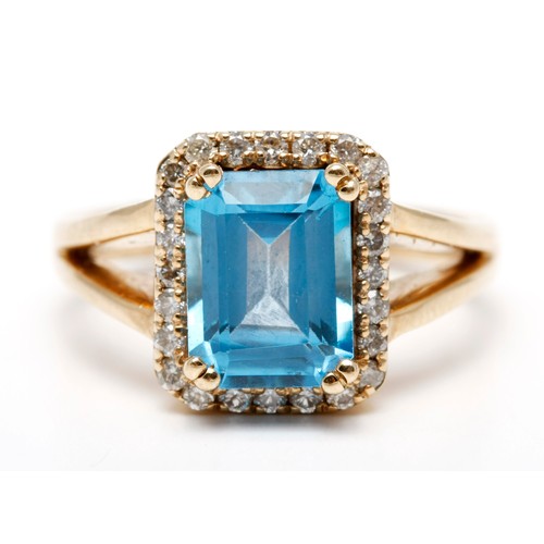 59 - A TOPAZ AND DIAMOND DRESS RING