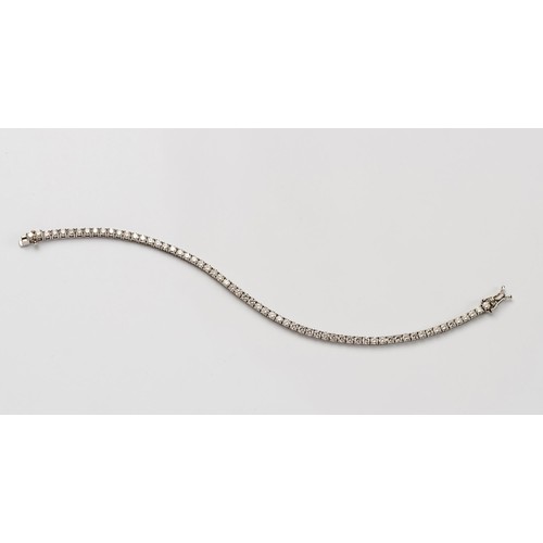 146 - A DIAMOND TENNIS BRACELET 5.07 CARATS