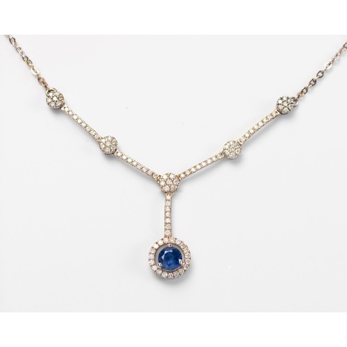 155 - A SAPPHIRE AND DIAMOND NECKLACE