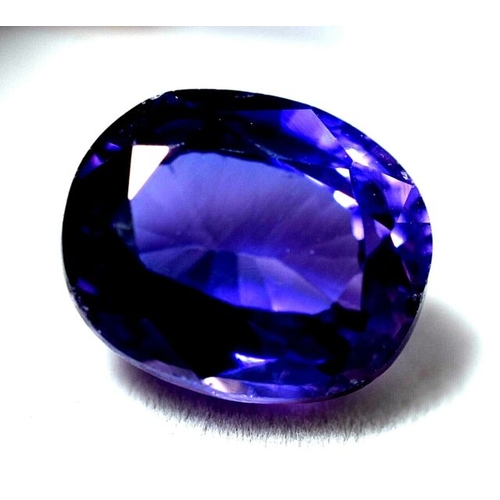 158 - A PARCEL OF 10 CERTIFIED TANZANITES 19.77 CARATS .