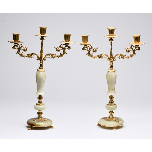 629 - A PAIR OF GREEN ONYX AND GILT METAL 3 LIGHT CANDELABRA