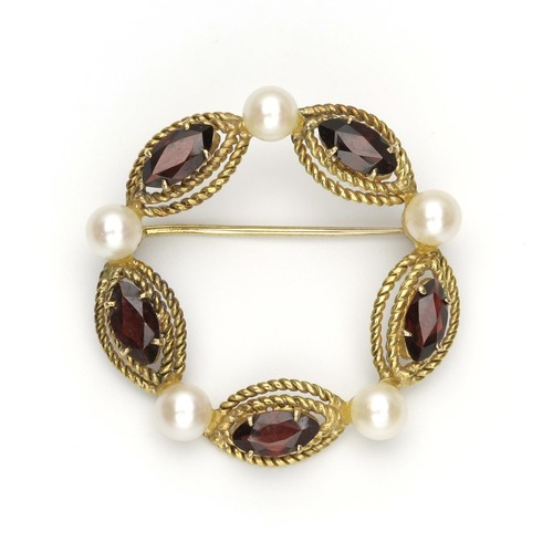 779 - PEARL AND GARNET BROOCH