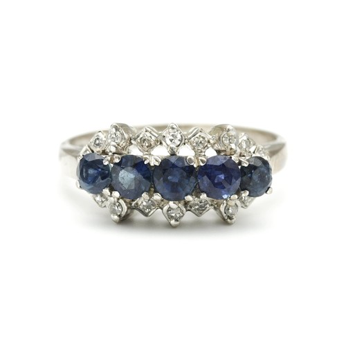 1440 - A SAPPHIRE AND DIAMOND RING