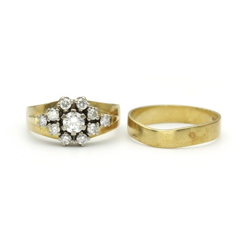 1414 - A DIAMOND DRESS RING AND MATCHING BAND