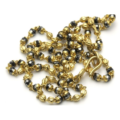 1377 - A GOLD BEADED CHAIN