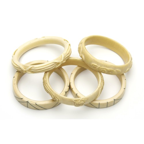 1470 - A COLLECTION OF TUSK BANGLES