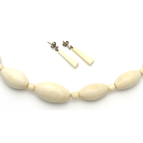 1476 - A SUITE OF TUSK JEWELLERY