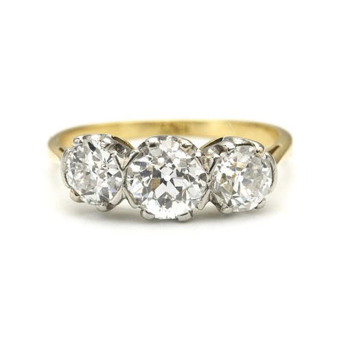 1420 - A DIAMOND TRILOGY RING, 1.00 CARATS