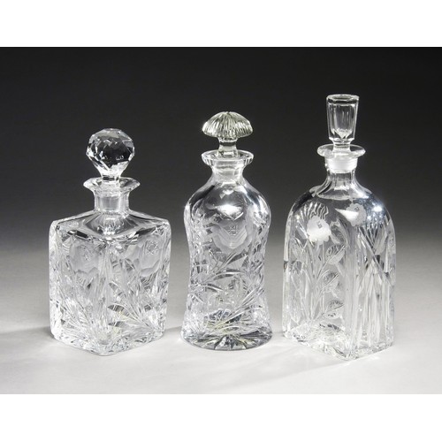 913 - THREE ASSORTED CZECH CRYSTAL ROSE PATTERN DECANTERS