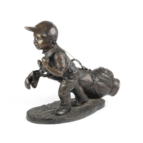 961 - A BRONZE FIGURE OF A GOLF CADDY