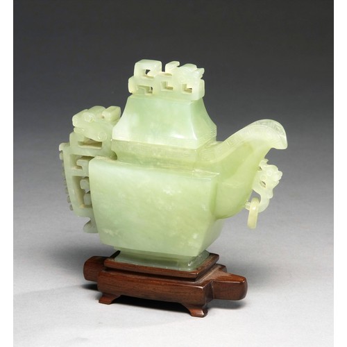 993 - A CHINESE GREEN HARDSTONE ARCHAISTIC POURING VESSEL, 