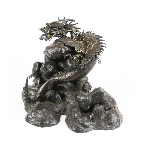 985 - A JAPANESE PATINATED BRONZE OF A WINGED DRAGON, MEIJI PERIOD, 1868 - 1912