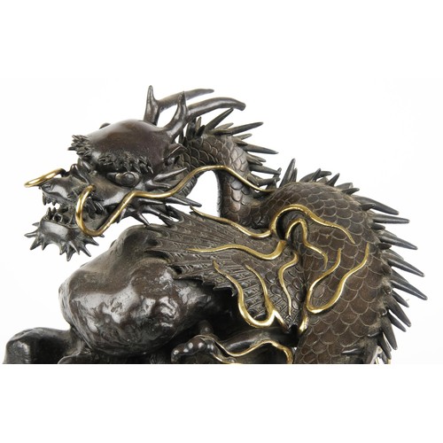 985 - A JAPANESE PATINATED BRONZE OF A WINGED DRAGON, MEIJI PERIOD, 1868 - 1912