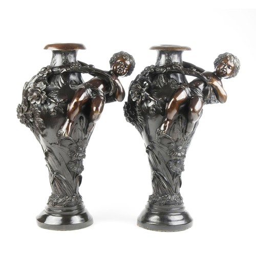 963 - A PAIR OF BRONZE URNS