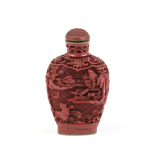 515 - A CHINESE CINNABAR STYLE SNUFF BOTTLE