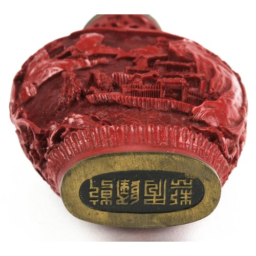 515 - A CHINESE CINNABAR STYLE SNUFF BOTTLE