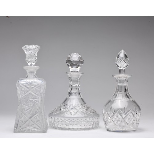 558 - A SET OF THREE GLASS DECANTERS