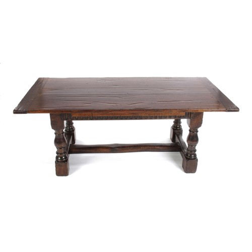 607 - AN OAK DRAWER-LEAF REFECTORY TABLE, 19TH CENTURY