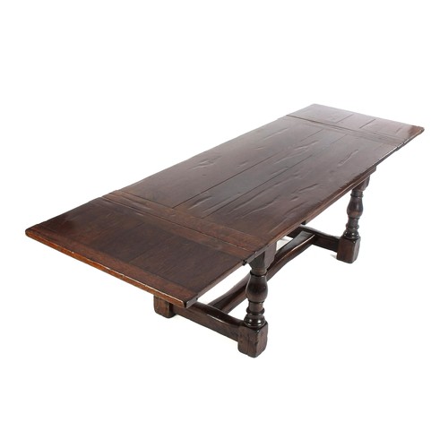 607 - AN OAK DRAWER-LEAF REFECTORY TABLE, 19TH CENTURY