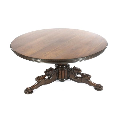 1153 - A VICTORIAN WALNUT CIRCULAR DINING TABLE