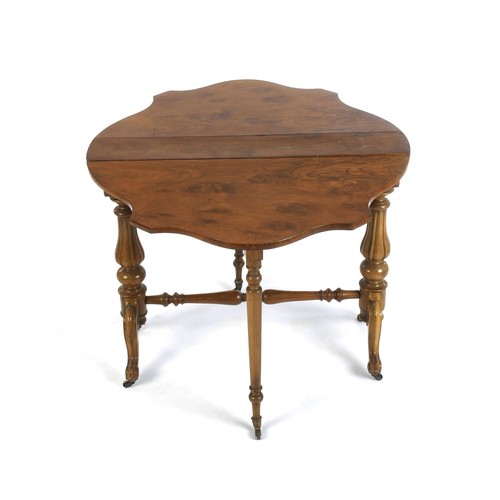 1150 - A WALNUT SUTHERLAND TABLE