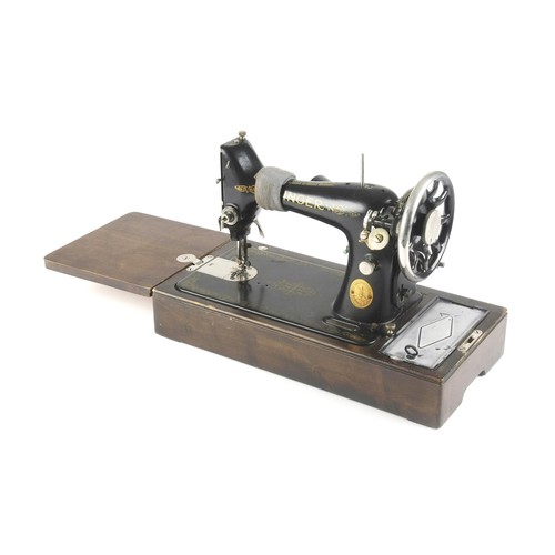 376 - A SINGER SEWING MACHINE