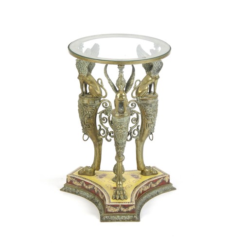 618 - A GLASS AND BRASS OCCASIONAL TABLE