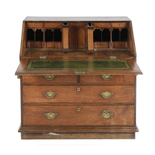 1123 - A GEORGE III MAHOGANY BUREAU, EARLY 19TH CENTURY