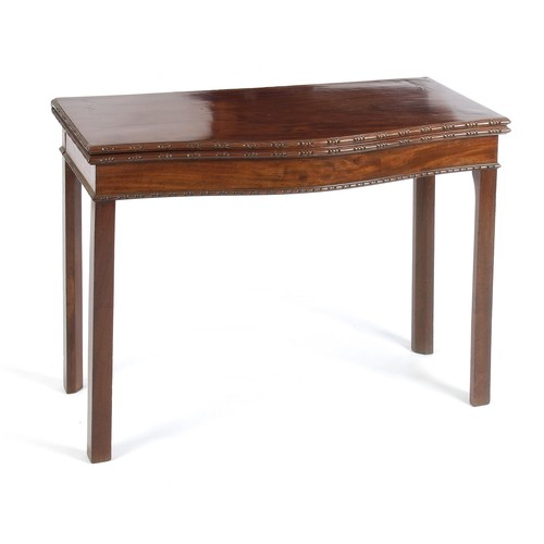 1124 - A GEORGE III-STYLE MAHOGANY FOLDOVER CARD TABLE