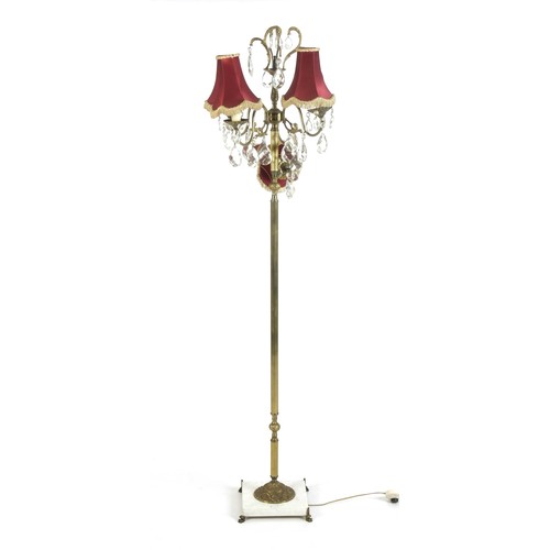 948 - A GILT BRASS FOUR-LIGHT STANDARD LAMP