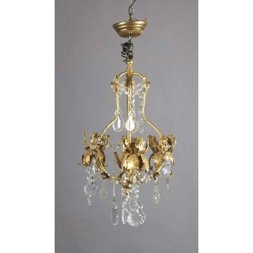 944 - A GOLD-PAINTED AND GLASS THREE-LIGHT CHANDELIER