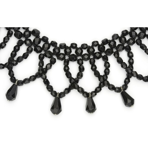 804 - A BLACK BEADED NECKLACE