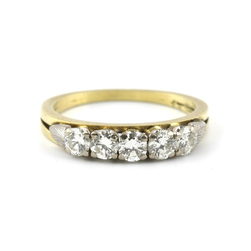 1426 - A DIAMOND ETERNITY RING, LONDON, MID 20TH CENTURY