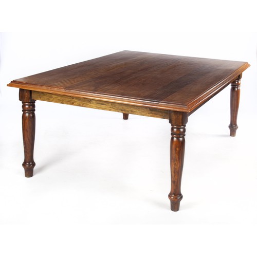 343 - A SOUTH AFRICAN TEAK DINING TABLE, EARLY 20TH CENTURY