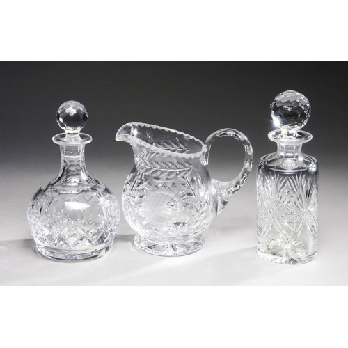 589 - TWO CRYSTAL DECANTERS AND A CRYSTAL JUG