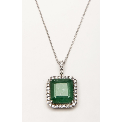 748 - AN EMERALD AND DIAMOND PENDANT