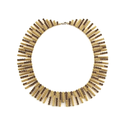 811 - A ROLLED GOLD AND FAUX GEMSTONE NECKLACE