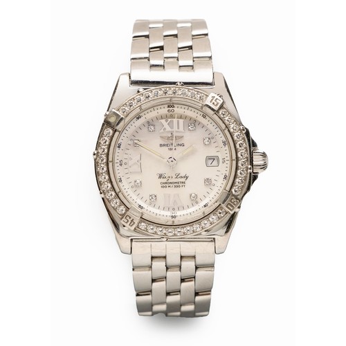 555 - A DIAMOND AND STAINLESS STEEL WRISTWATCH, BREITLING WINGS LADY