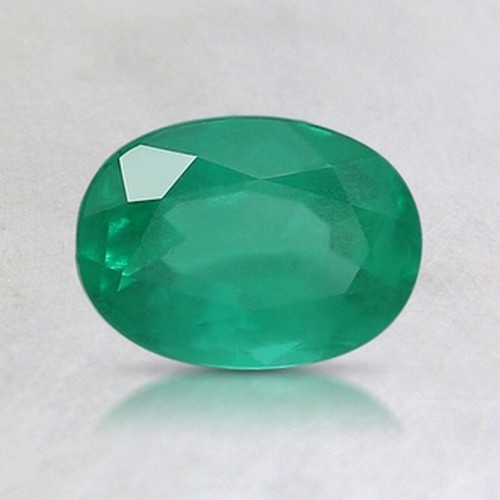 1355 - AN UNSET EMERALD, 0.34 CARATS