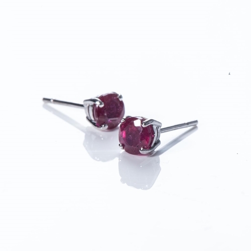 97 - A PAIR OF RUBY STUDS