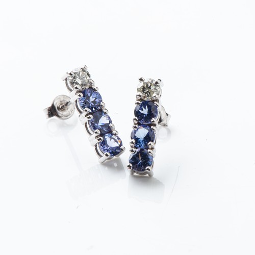 86 - A PAIR OF TANZANITE AND DIAMOND EARRINGS