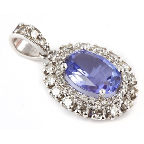 117 - A DIAMOND AND TANZANITE PENDANT