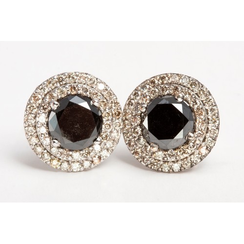 83 - A PAIR OF DIAMOND HALO EARRINGS