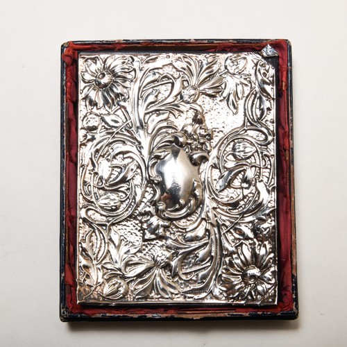 860 - AN ELIZABETH II SILVER MOUNTED PHONEBOOK COVER, KEYFORD FRAMES, LONDON, 1990