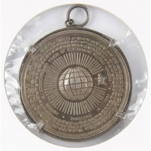 754 - A SILVER ONE OUNCE PENDANT, 1991